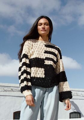 PULL EN MOTIF AJOURE EN BRIDES Setapura de Lana Grossa